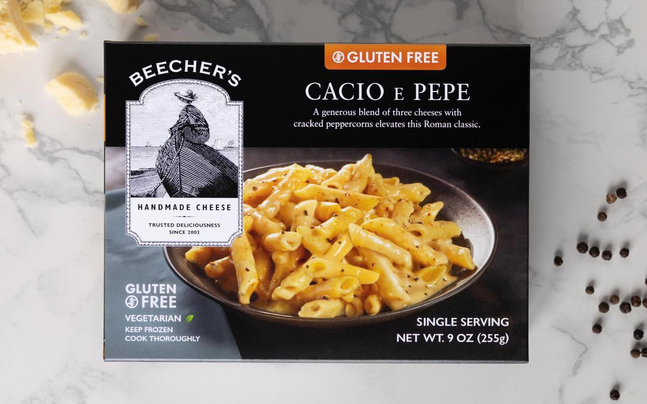 GF Cacio 9oz Beauty box front with black peppercorn and Flagship cheese