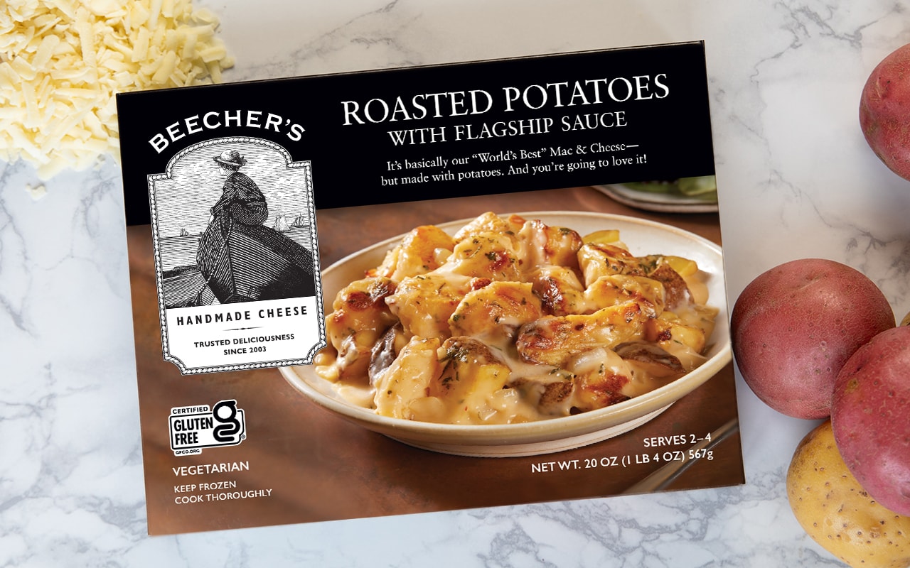 Roasted Potatoes in Flagship Sauce beauty shot with packaging