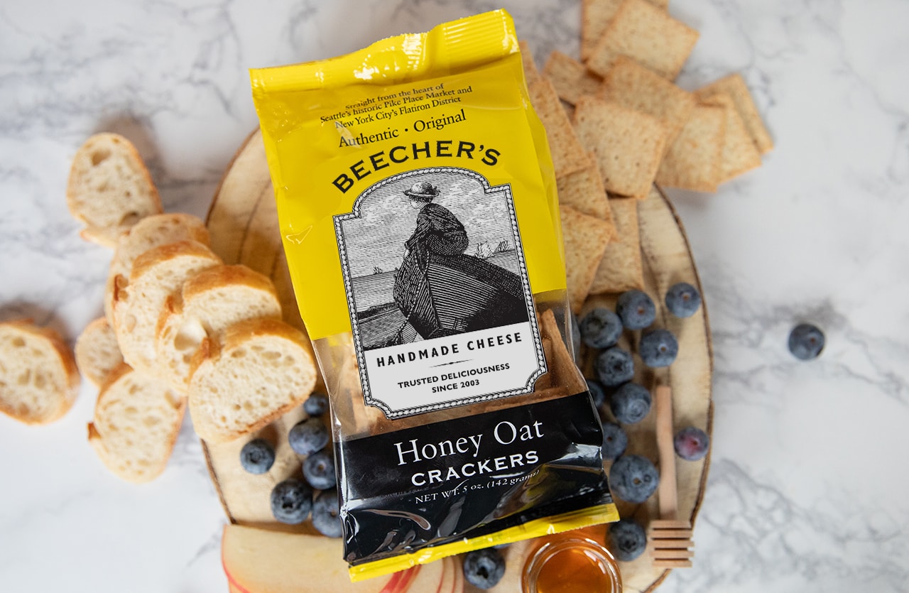 Honey oat crackers beauty shot with packaging